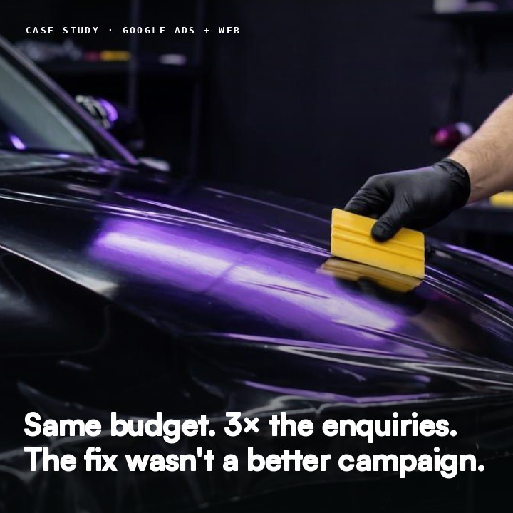 PPF film being applied to a black car at CarDetailer